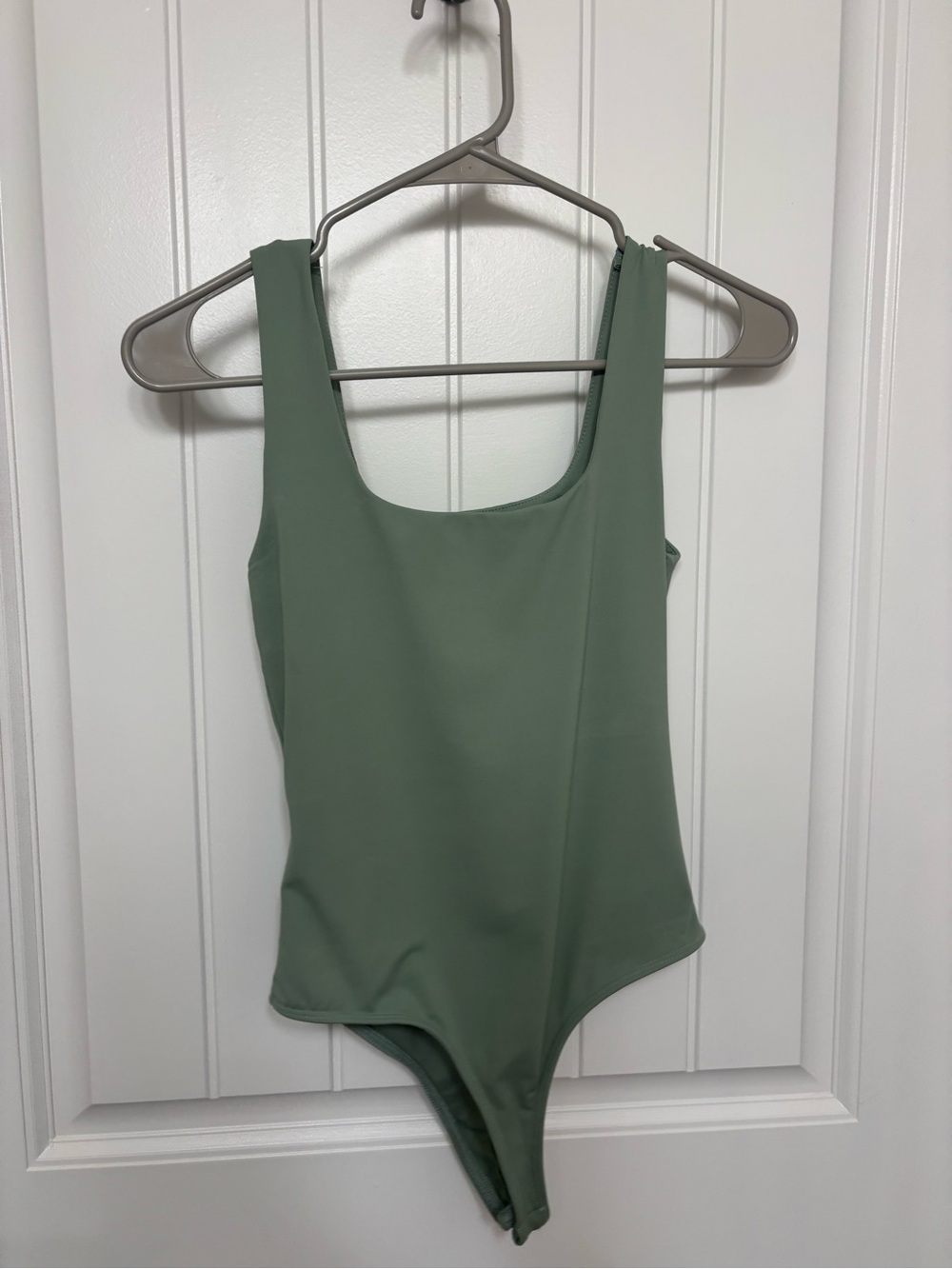 Francesca’s Light Green Bodysuit